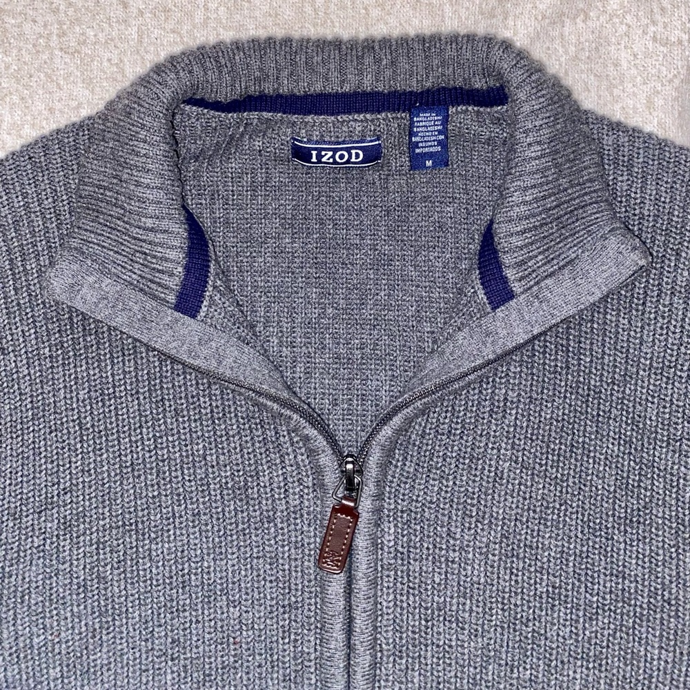 Brand new medium sized IZOD full zip light jacket.